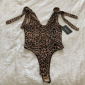 Leopard Print Bodysuit with tags never worn